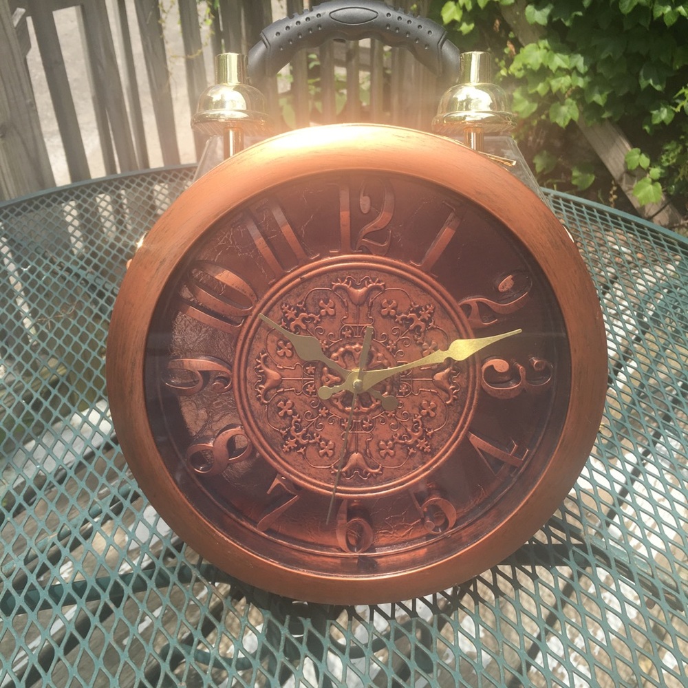 Samuel Dong clock handbag